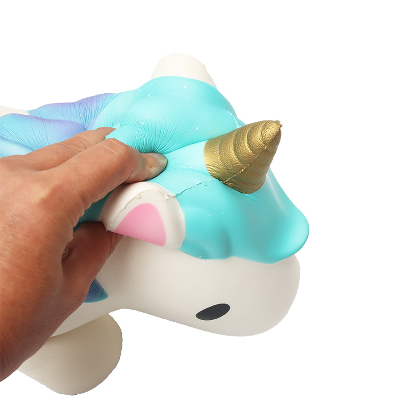 An enormous one-horned colorful horse