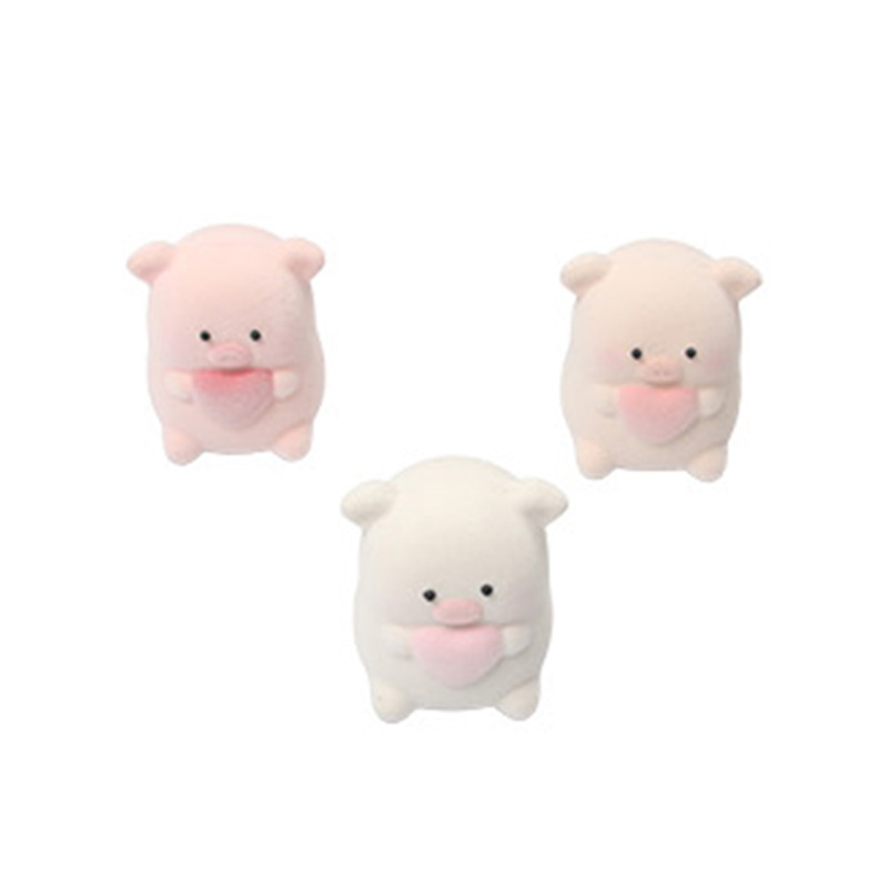 A plush heart-shaped piggy